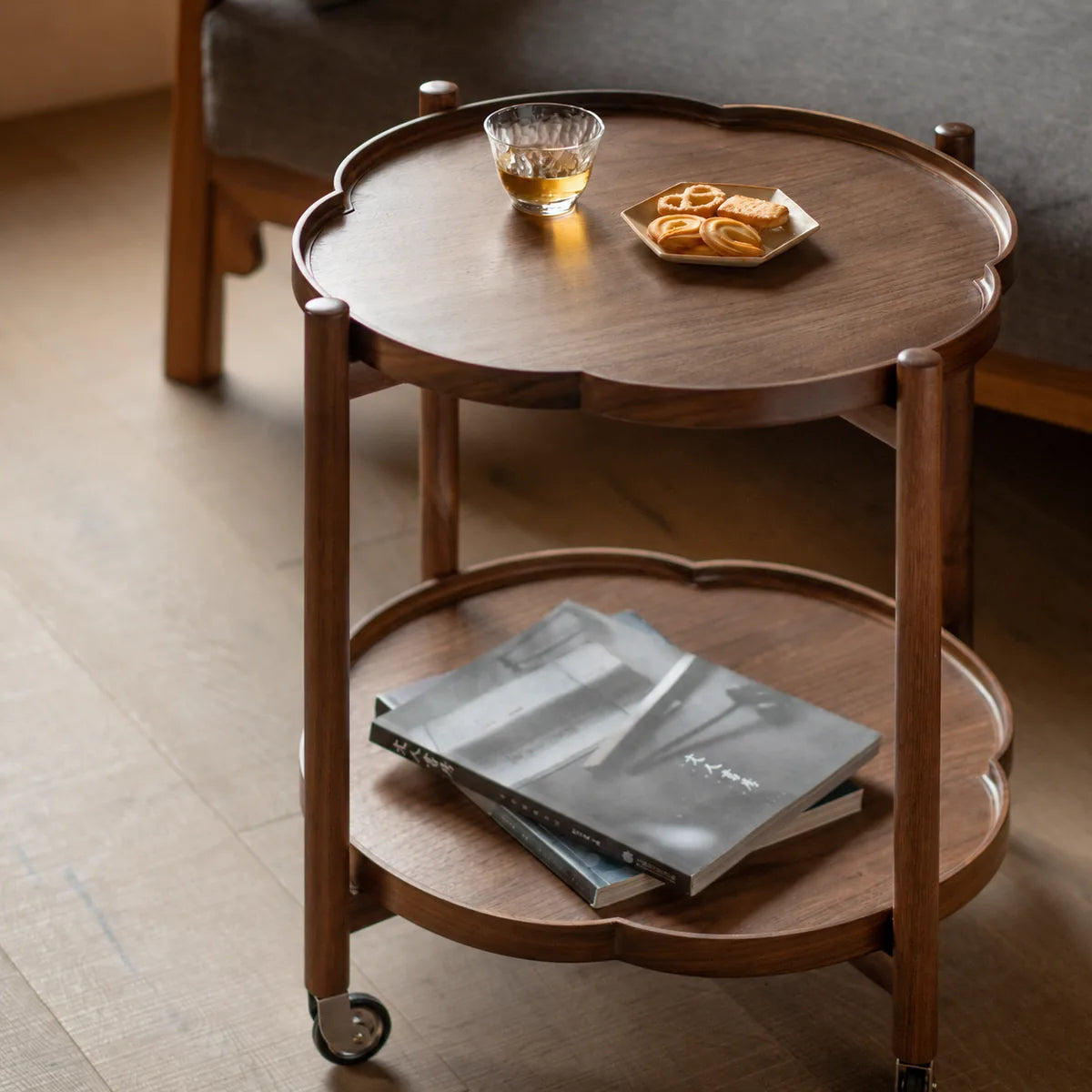 Close-up of the begonia-shaped walnut removable tray