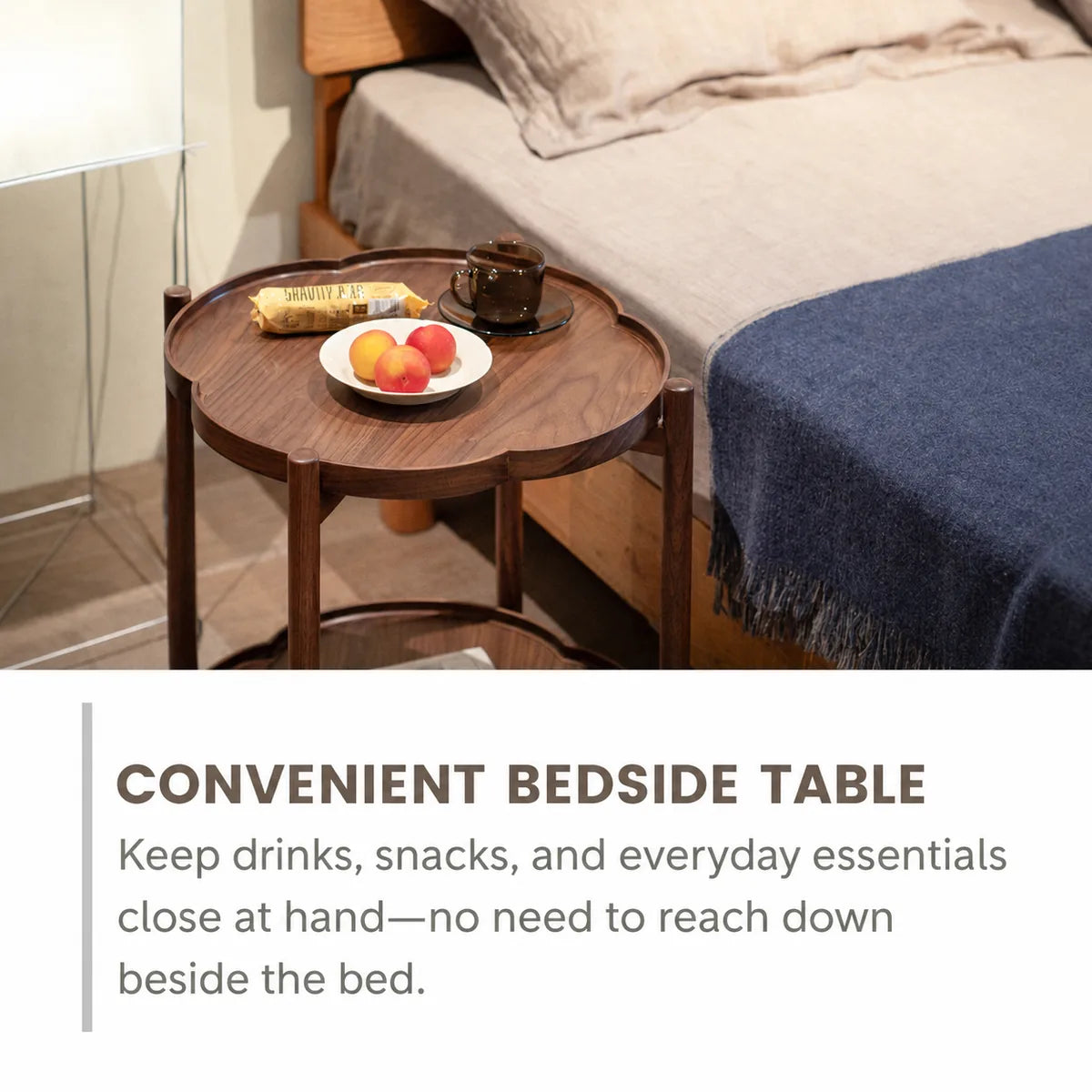 Walnut side table used as a bedside table