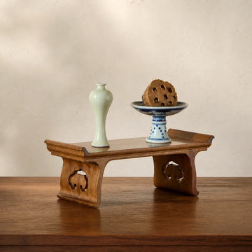 Handcrafted Golden Phoebe wood Ruyi display stand with celadon and blue-and-white objects