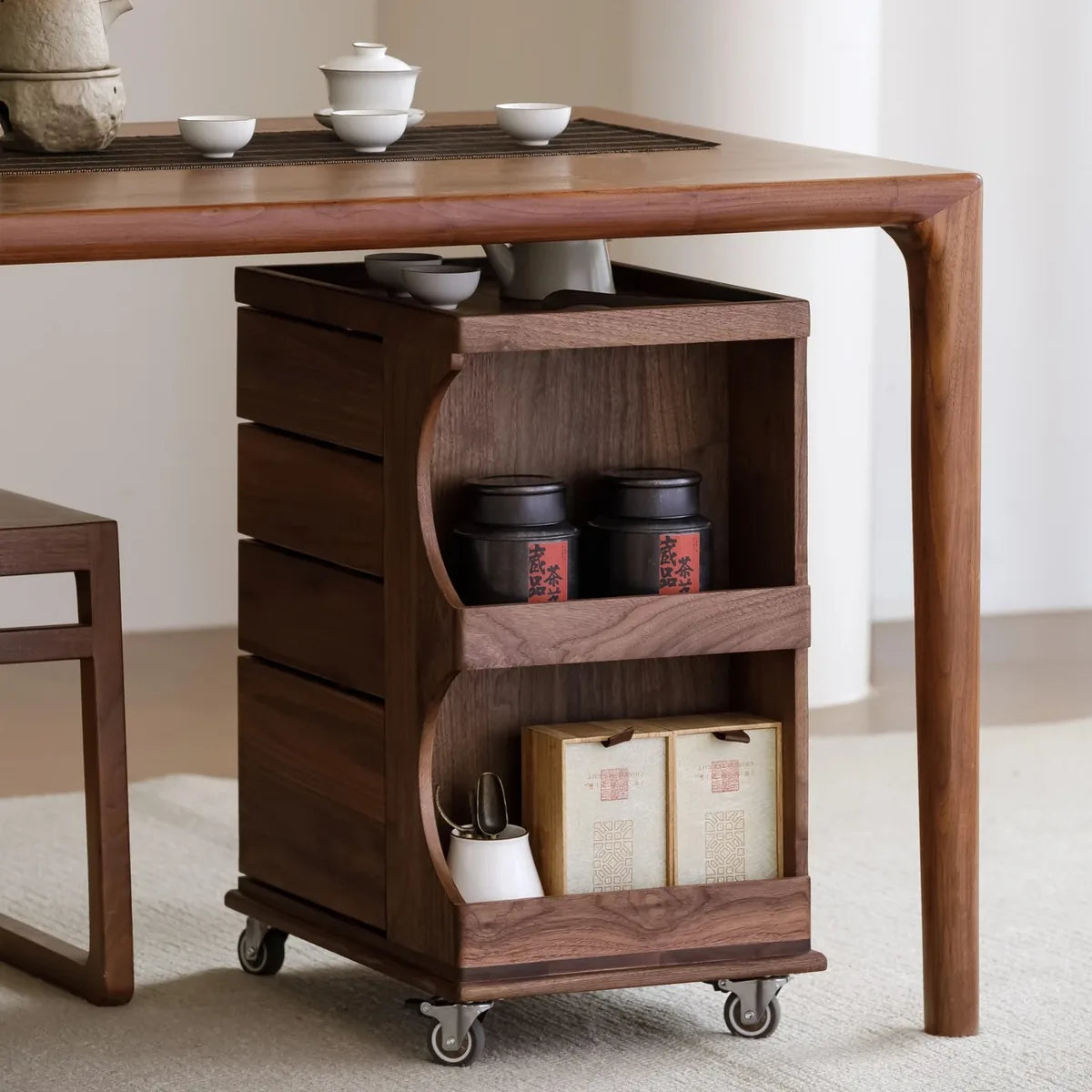 Two open side shelves for tea canisters and accessories