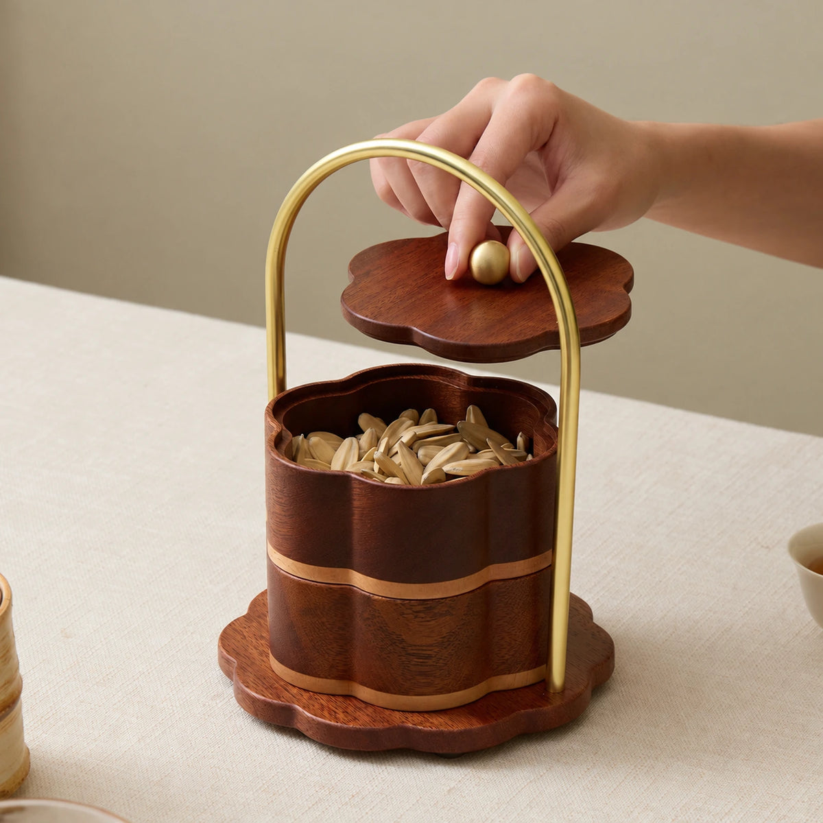 Open upper compartment of the floral handled wooden snack box