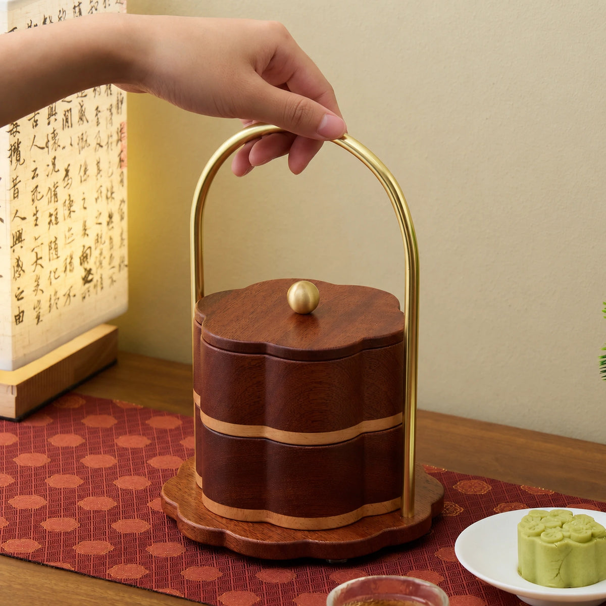 Wooden snack box lifted by its curved metal handle