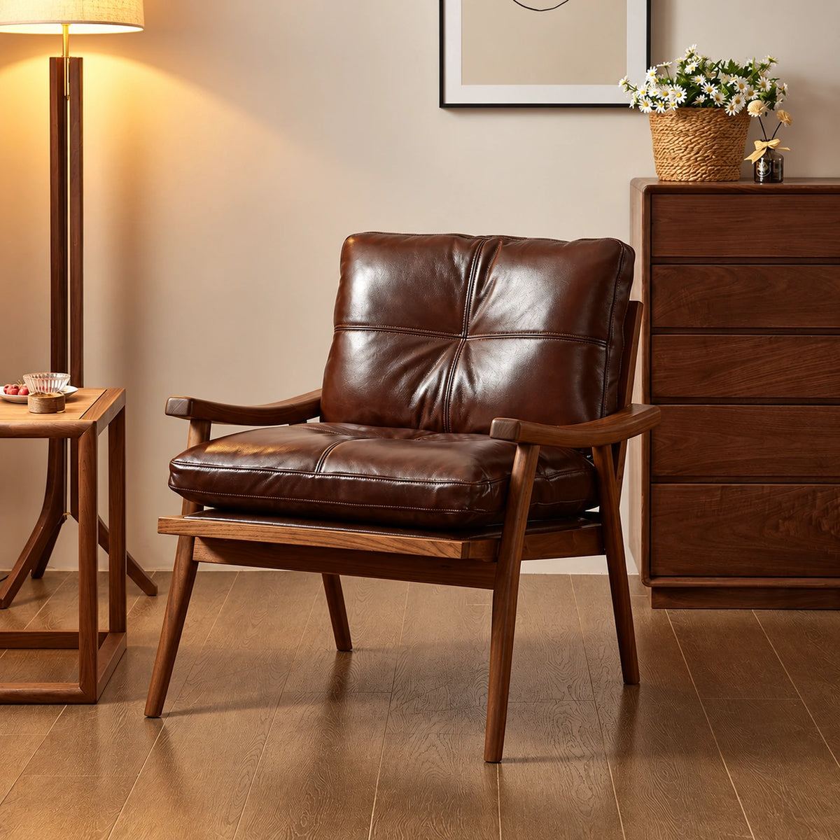 Lounge chair shown with brown leather cushion