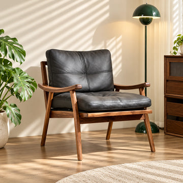 Solid wood lounge chair with black leather cushion, front view