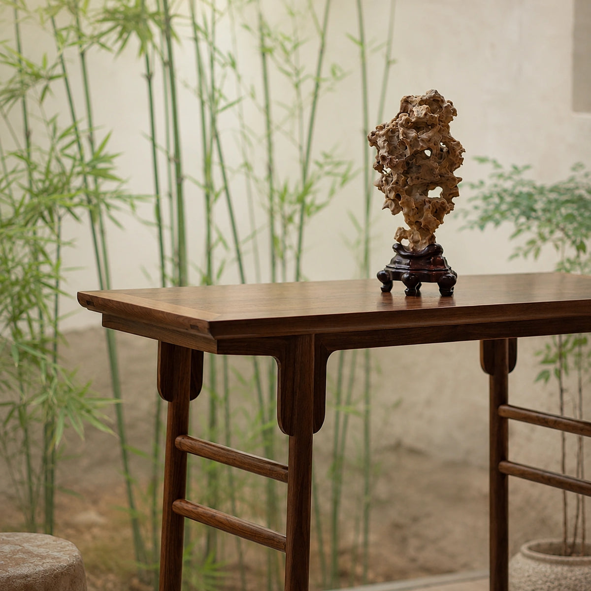 Slim wooden console table styled with flowers