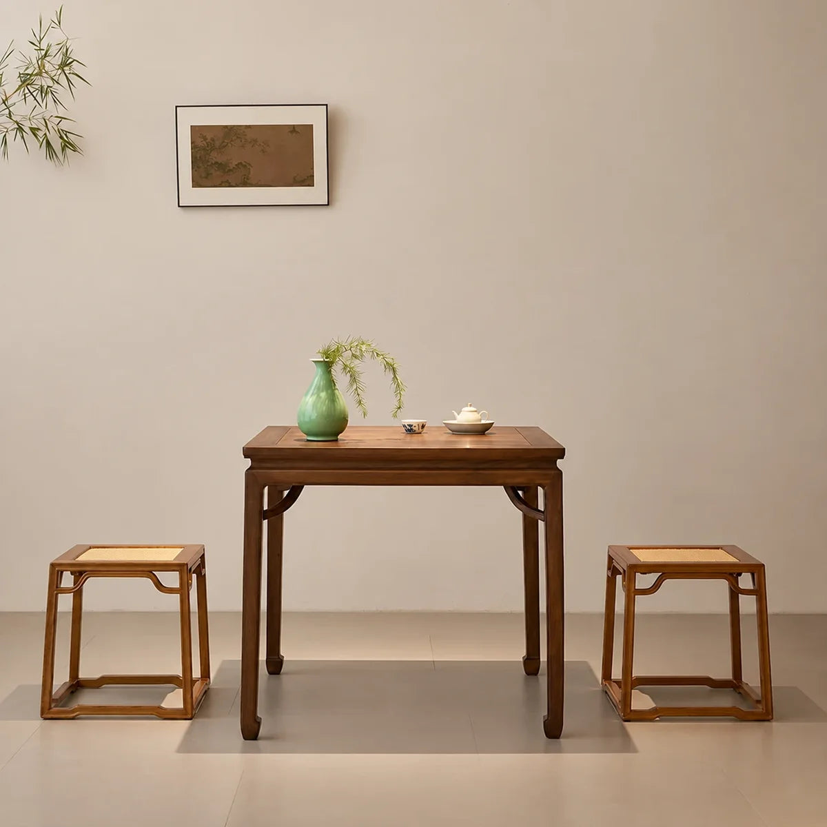 Black walnut square table styled with stools — stools not included