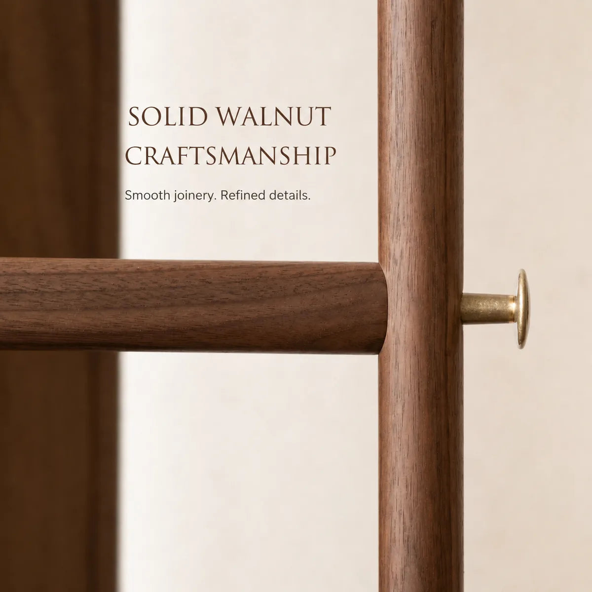 Close-up of solid walnut joinery and brass detail